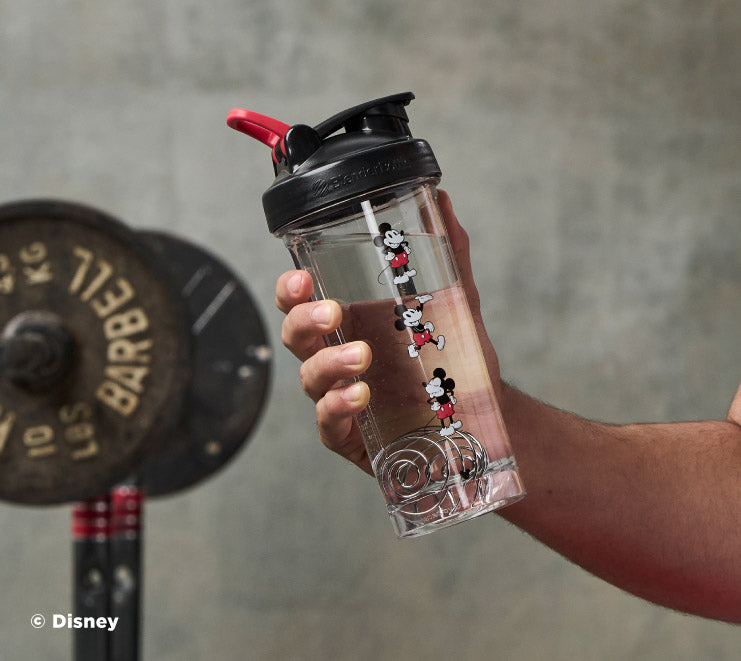 pro-series-z0 Mickey_Mouse_Protein_Shaker_Bottle_Being_Held_In_the_Gym.jpg